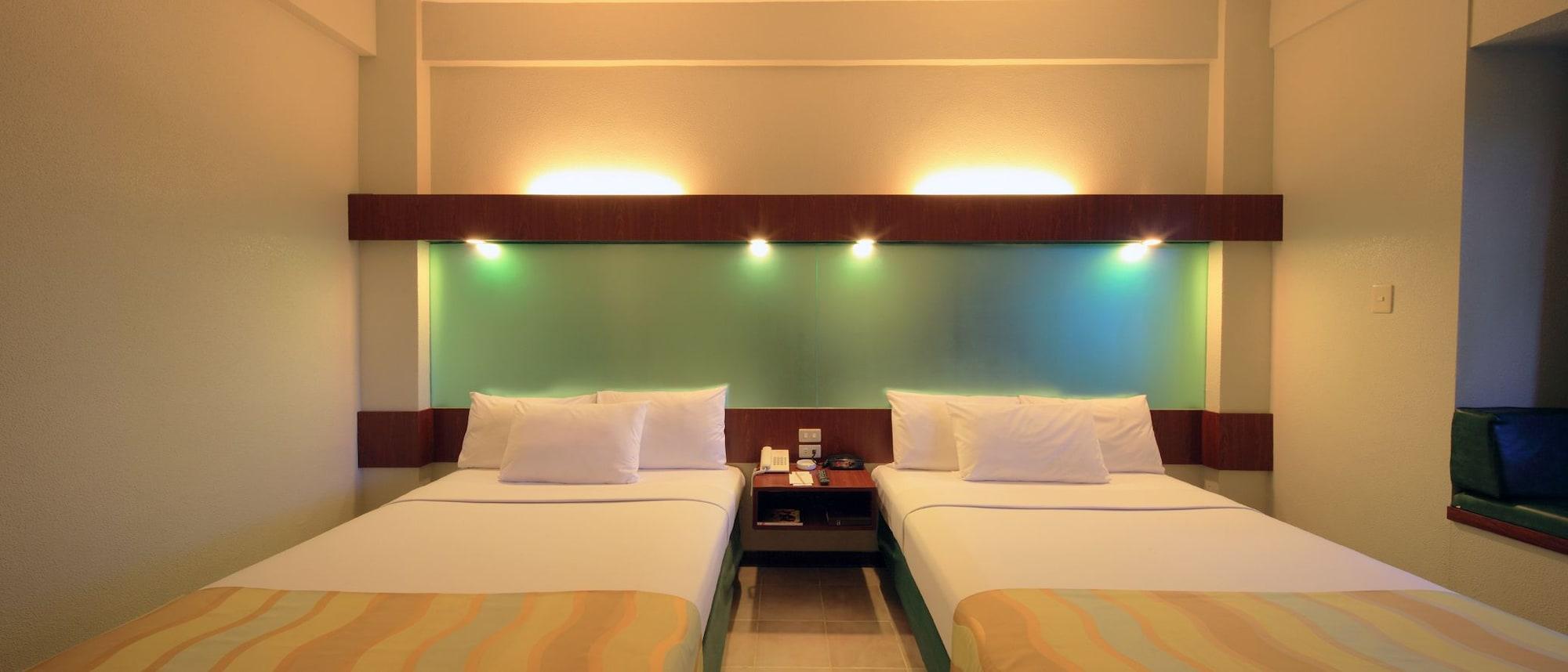 Microtel By Wyndham Tarlac Экстерьер фото