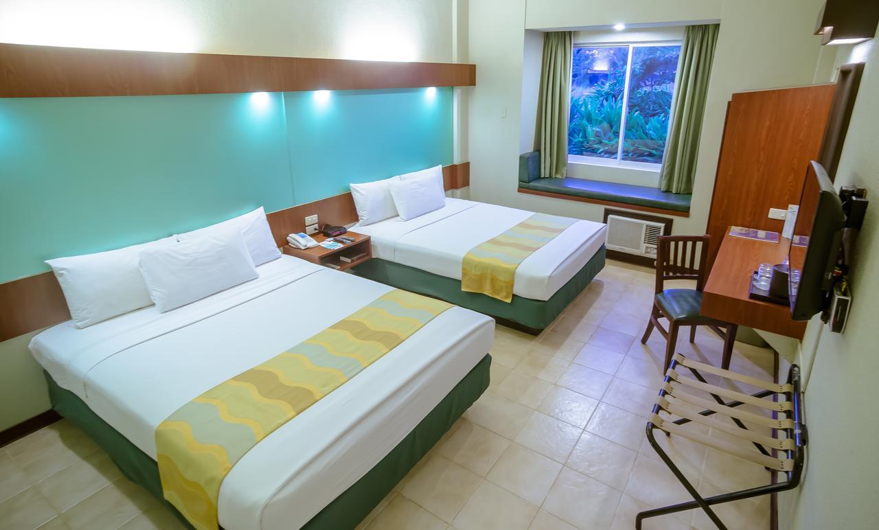 Microtel By Wyndham Tarlac Экстерьер фото