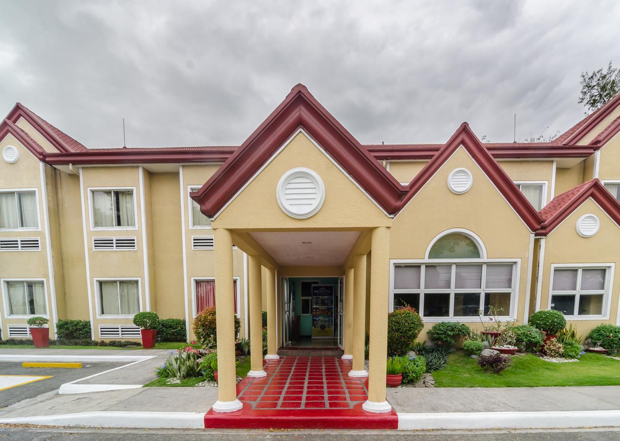 Microtel By Wyndham Tarlac Экстерьер фото