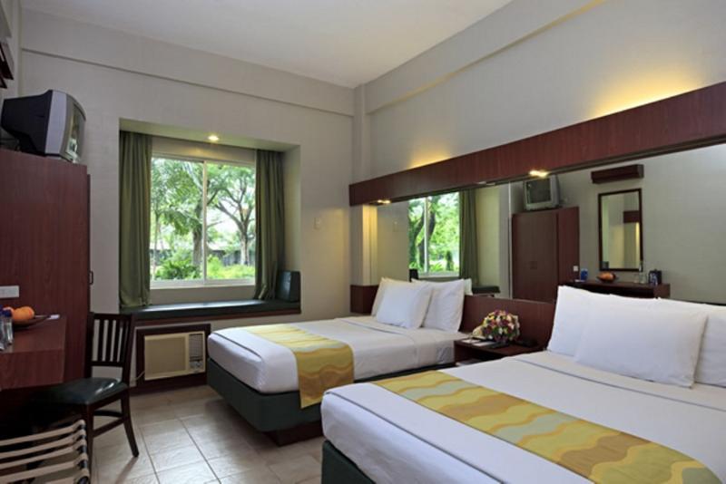 Microtel By Wyndham Tarlac Экстерьер фото